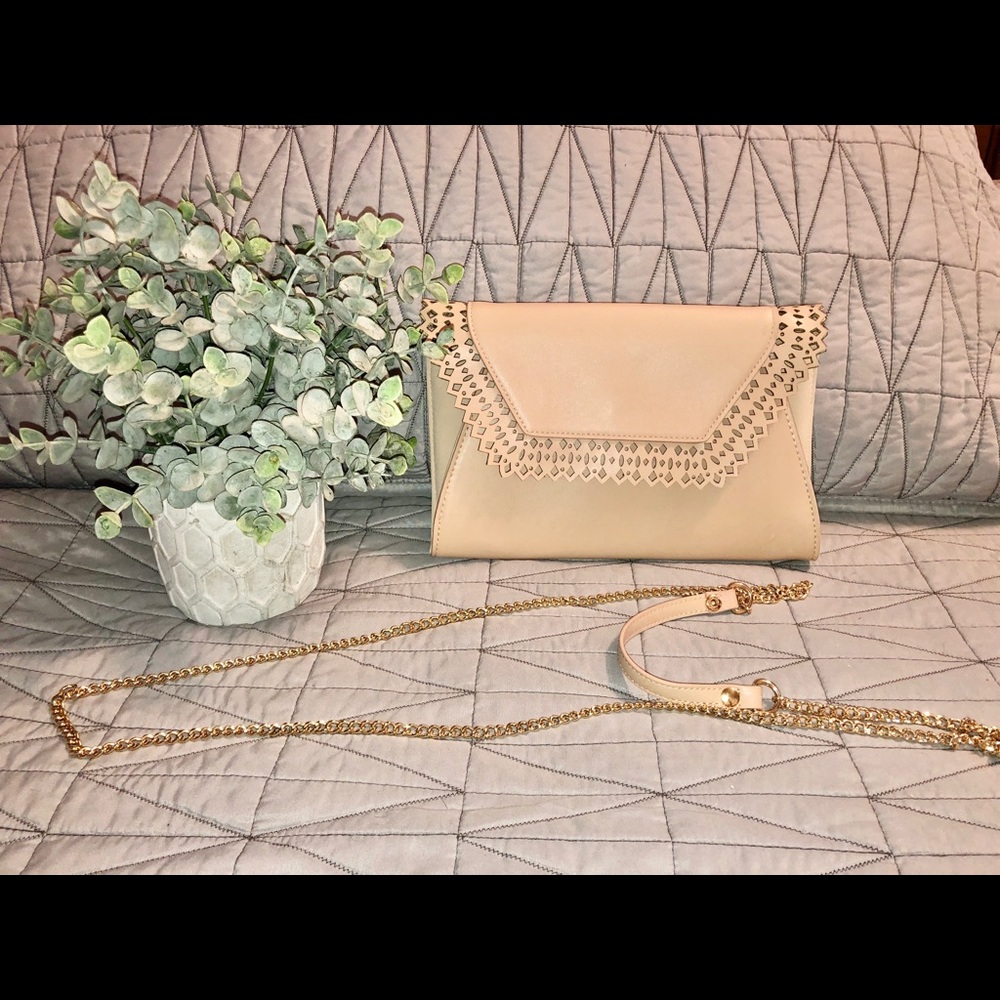 Nude clutch bag.